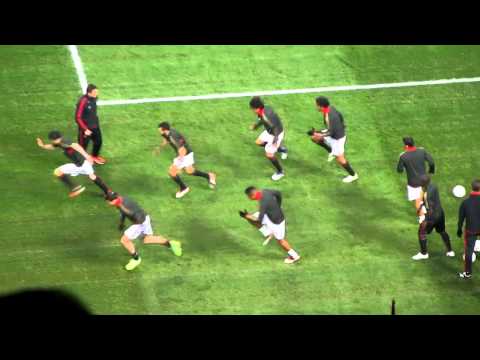 AC Milan players warming up before the match