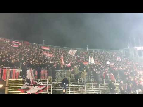 AC Milan fans chant together last night when Milan play against Atalanta